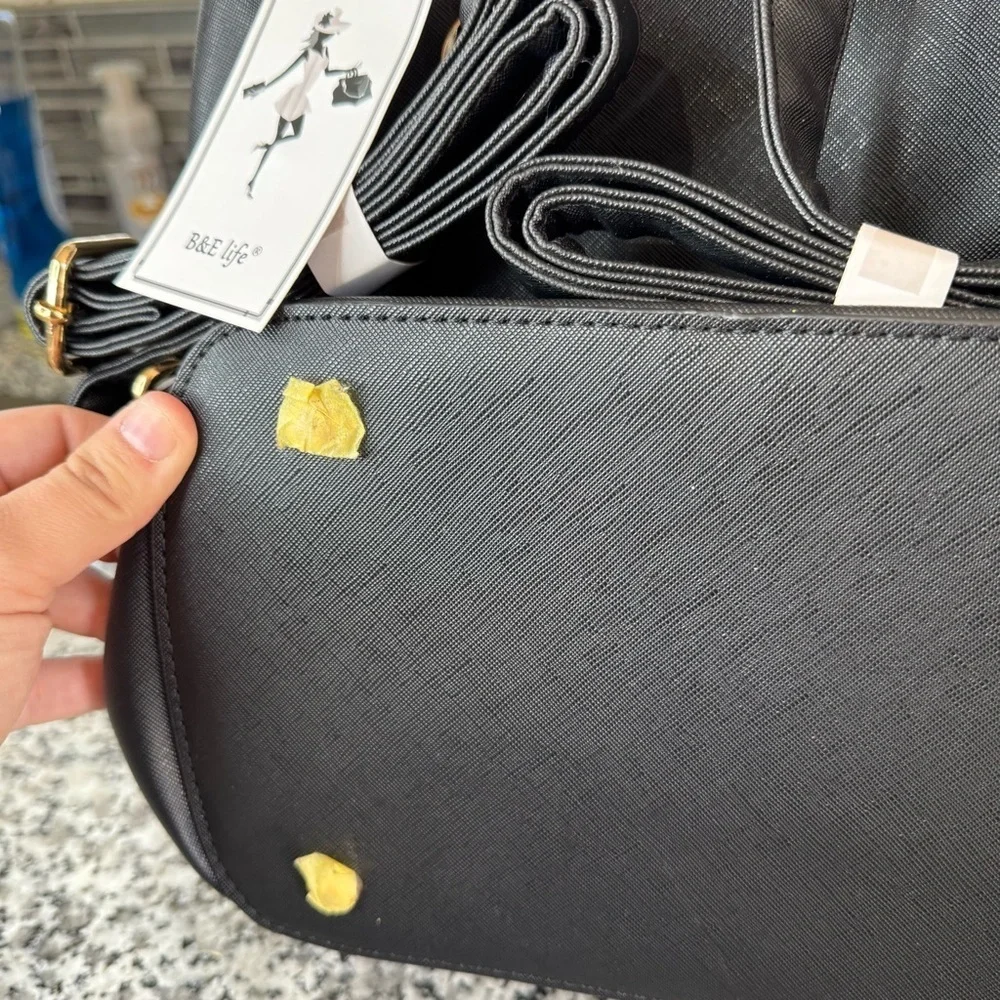 Brand New With Tags Black Backpack with Gold Accents